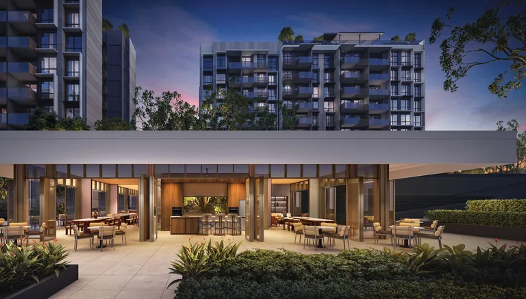 The Sen, artist’s impression: the clubhouse lounges lit at dusk, opening onto a planted terrace below the residential blocks
